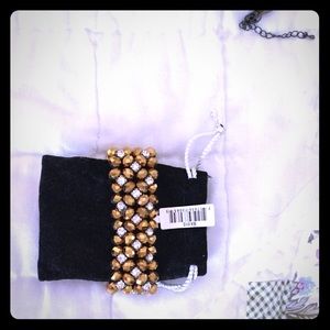 Gold and rhinestone bracelet